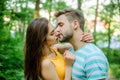 Couple in love kissing with passion outdoors. Man and woman attractive lovers romantic kiss. Passionate kiss concept Royalty Free Stock Photo