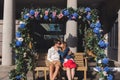 Couple in love kissing. seated on a swinging bench in covent garden London Royalty Free Stock Photo