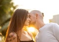 Couple in love laughing looking at each other in the Bangkok park  and tropical threes Royalty Free Stock Photo