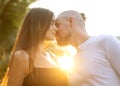 Couple in love laughing looking at each other in the Bangkok park  and tropical threes Royalty Free Stock Photo