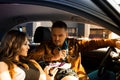 Couple in love looking at each other in car Royalty Free Stock Photo