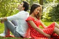 Couple in love lying on the grass in the park Royalty Free Stock Photo