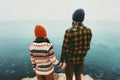 Couple in love Man and Woman holding hands together above sea on cliff Travel happy emotions Lifestyle concept. Young family trave Royalty Free Stock Photo