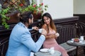 couple in love of man and woman meet in cafe outdoor drink coffee, first meet Royalty Free Stock Photo