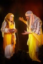 A couple in love or a married couple in stylized Eastern clothing from Israel, Palestine, Iran, Pakistan together. A