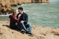 Couple in love by the ocean. Travel concept Royalty Free Stock Photo