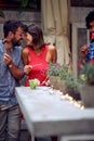 A couple in love at the open air birthday party. Quality friendship time together Royalty Free Stock Photo