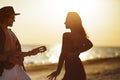 Couple in Love Playing Guitar and Dancing on the Beach Royalty Free Stock Photo