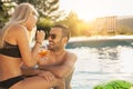 Couple at a swimming pool Royalty Free Stock Photo