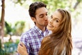 Couple love, portrait or cheek kiss embrace on valentines day, romance date or bonding in nature park or relax garden Royalty Free Stock Photo