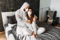 A couple in love quarantined at home. The couple stayed at home during the epidemic. Royalty Free Stock Photo