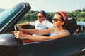 Couple in love ride in cabriolet car Royalty Free Stock Photo