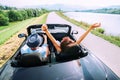 Couple in love ride in cabriolet car Royalty Free Stock Photo