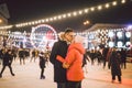 Couple in Love. Romantic Characters for Feast of Saint Valentine. True love. Happy Couple Having Fun at city ice rink in Royalty Free Stock Photo