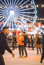 Couple in Love. Romantic Characters for Feast of Saint Valentine. True love. Happy Couple Having Fun at city ice rink in Royalty Free Stock Photo