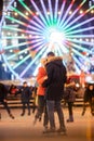 Couple in Love. Romantic Characters for Feast of Saint Valentine. True love. Happy Couple Having Fun at city ice rink in the Royalty Free Stock Photo