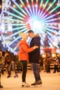 Couple in Love. Romantic Characters for Feast of Saint Valentine. True love. Happy Couple Having Fun at city ice rink in the Royalty Free Stock Photo