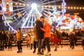 Couple in Love. Romantic Characters for Feast of Saint Valentine. True love. Happy Couple Having Fun at city ice rink in the Royalty Free Stock Photo