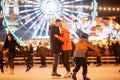 Couple in Love. Romantic Characters for Feast of Saint Valentine. True love. Happy Couple Having Fun at city ice rink in the Royalty Free Stock Photo