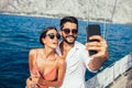 Couple on a sail boat in the summer make selfie Royalty Free Stock Photo