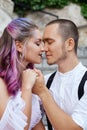 Couple in love is sitting on the stairs and embracing. Love and relationships between men and women. Royalty Free Stock Photo