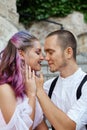 Couple in love is sitting on the stairs and embracing. Love and relationships between men and women. Royalty Free Stock Photo