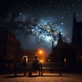 A couple in love is sitting together at night enjoying the view of the night sky. Royalty Free Stock Photo