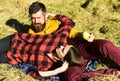 Couple in love spends time in park. Autumn and dating Royalty Free Stock Photo