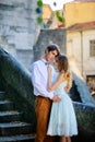 Couple in love strolling around an old castle Royalty Free Stock Photo