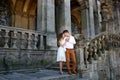 Couple in love strolling around an old castle Royalty Free Stock Photo