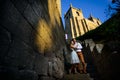 Couple in love strolling around an old castle Royalty Free Stock Photo