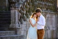 Couple in love strolling around an old castle Royalty Free Stock Photo