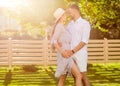 Couple in love at sunset embrace. American style Royalty Free Stock Photo