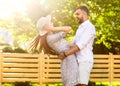 Couple in love at sunset embrace. American style. Royalty Free Stock Photo