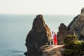 Couple in love at sunset by the sea. Honeymoon. Honeymoon trip. Boy and girl at the sea. Man and woman traveling Royalty Free Stock Photo