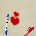 Couple in love of two toothbrushes.St. Valentines Day. Selective focus. Royalty Free Stock Photo
