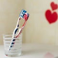 Couple in love of two toothbrushes.St. Valentines Day. Royalty Free Stock Photo