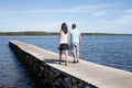 couple in love in vacation walk on pontoon lake beach Royalty Free Stock Photo