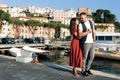 Summer love story in Italy. Couple on the pier Royalty Free Stock Photo