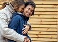 Couple in love are walking in the autumn park. Afroamerican girl with a European Royalty Free Stock Photo