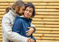 Couple in love are walking in the autumn park. Afroamerican girl with a European Royalty Free Stock Photo