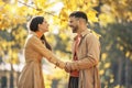 Couple in love walking on autumn park, enjoying a beautiful autumn day Royalty Free Stock Photo