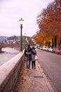 Couple in love walking in the autumn streets of Verona. Stylish young couple walking on european autumn streets , have fun and