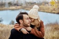 Couple in love walking in the Park, Valentine`s day. A man and a woman embrace and kiss, a couple in love, tender feelings Royalty Free Stock Photo