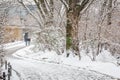 Couple in love walking by the river in the snow