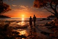 Couple in love walks along the seashore or ocean at sunset, holding hands