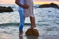 Couple in love walks at the beach in ocean shore Royalty Free Stock Photo