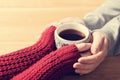 A couple in love warming hands with a hot mug of tea Royalty Free Stock Photo