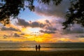 couple in love watching sun at sunset on the beach,Phuket Thailand. Royalty Free Stock Photo
