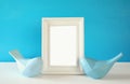 Couple of Lovebirds and blank photo frame Royalty Free Stock Photo